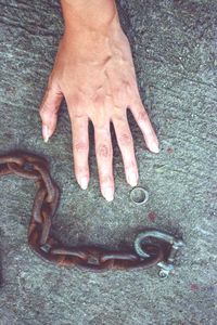 High angle view of man working on metal