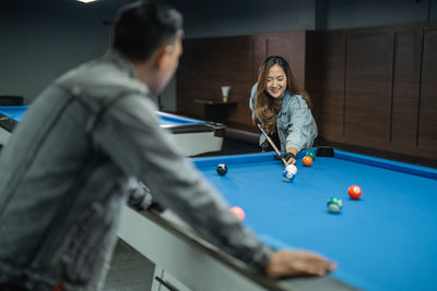 Man playing pool