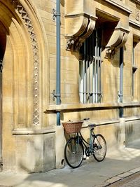 Bicycles on street against building