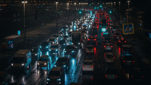 High angle view of traffic on city street at night