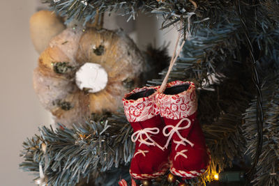 Close-up of christmas decoration hanging on tree