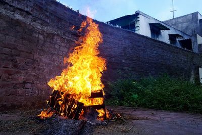 Bonfire in yard of house