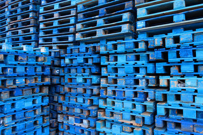 Full frame shot of blue wooden crates at warehouse