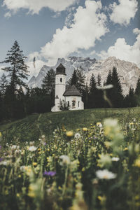 Church on hill against sky