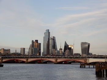 Bridge over river against sky