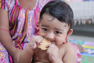 Portrait of cute girl holding ice cream