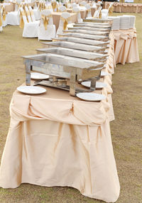 Chairs and table on field