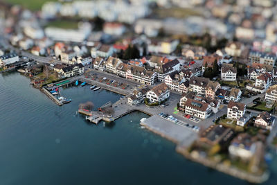 Aerial view of the harbor in stäfa edited with a miniature effect