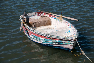 High angle view of boat moored in lake