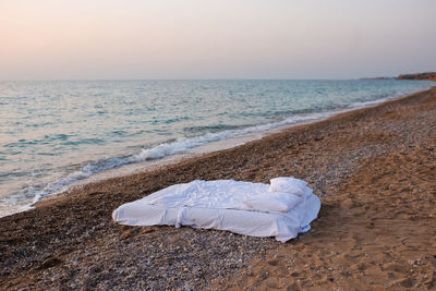 Scenic view of sea against sky during sunset