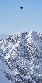 Scenic view of snowcapped mountain against sky