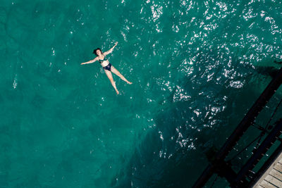 High angle view of person swimming in sea