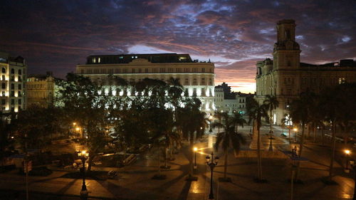 Illuminated buildings in city at night