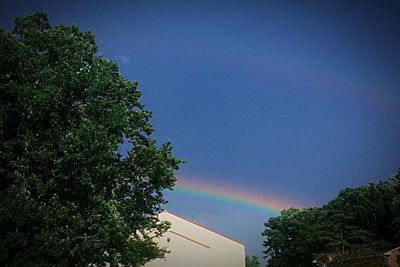 Low angle view of rainbow against clear sky