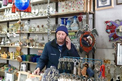 Portrait of man working in store