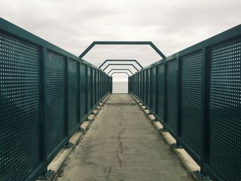 Metal structure against sky