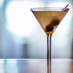 Close-up of beer glass on table
