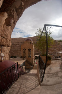 Staircase of historic building against sky