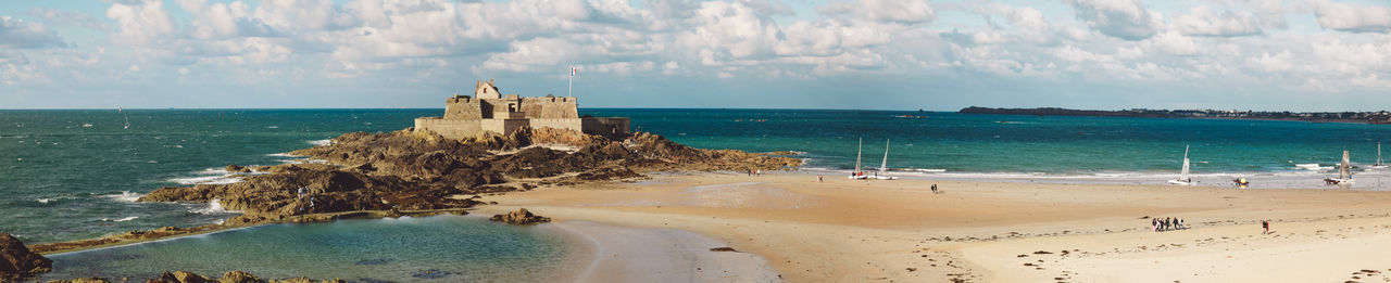 Panoramic view of beach against sky