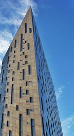 Low angle view of modern buildings against sky