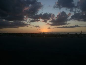 Scenic view of silhouette landscape against sky during sunset