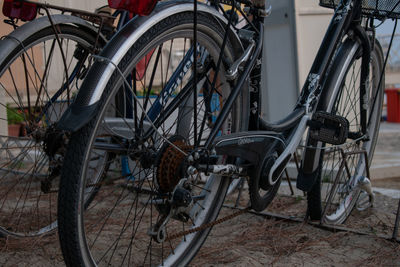 Bicycles parked on street in city