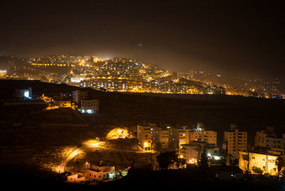 High angle shot of illuminated townscape