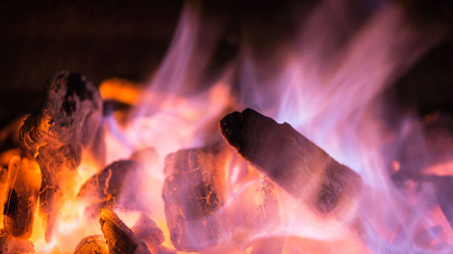 Close-up of bonfire on fire at night