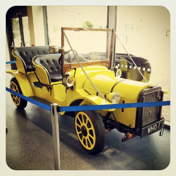 yellow, transfer print, indoors, still life, auto post production filter, no people, variation, large group of objects, table, metal, day, transportation, stationary, absence, group of objects, mode of transport, plastic, side by side, container, wood - material