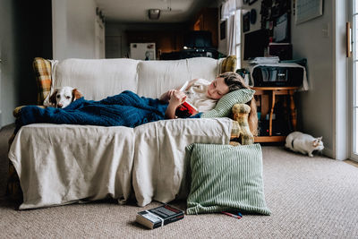 High angle view of woman resting at home