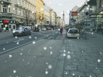 Cars on street in city