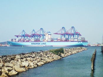 View of sea against clear blue sky