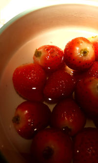 High angle view of strawberries in bowl