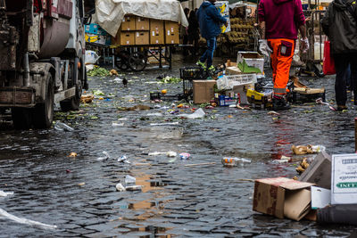 Group of people by river in city