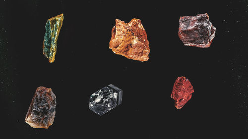 Close-up of rocks against black background