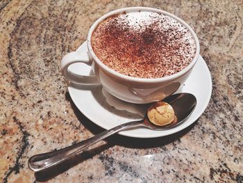 Close-up of coffee cup on table