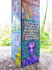 Graffiti on tree trunk