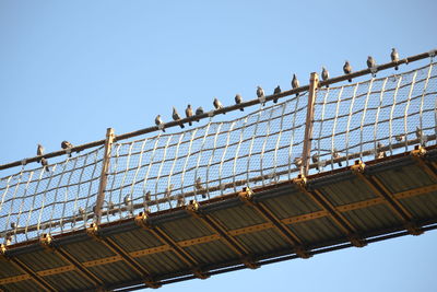 Low angle view of bridge against clear sky