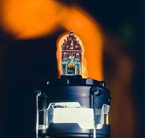 Close-up of metal structure against building