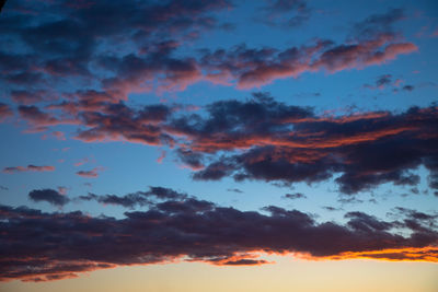 Low angle view of clouds in sky during sunset