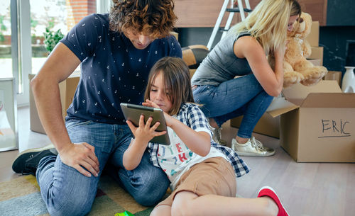 Women sitting on mobile phone