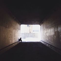 Empty corridor in tunnel