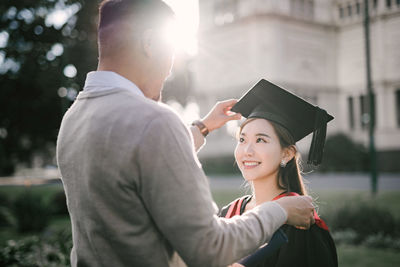 Young couple standing outdoors