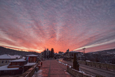 Colorful sunset over veliko tarnovo, seen from tsarevets, the medieval bulgarian capital