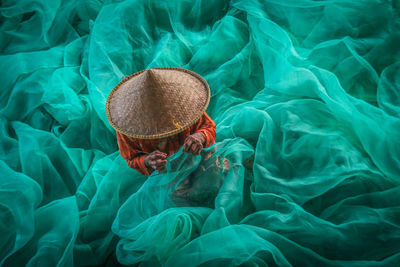 High angle view of woman wearing hat