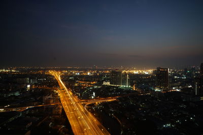 Aerial shot of illuminated cityscape