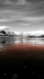 Reflection of clouds in calm lake