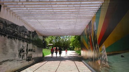 Full length of people walking on walkway