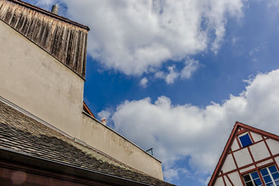 High section of building against cloudy sky