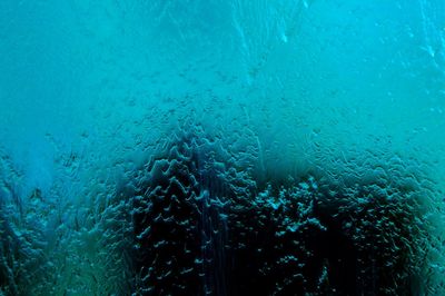 Full frame shot of wet glass